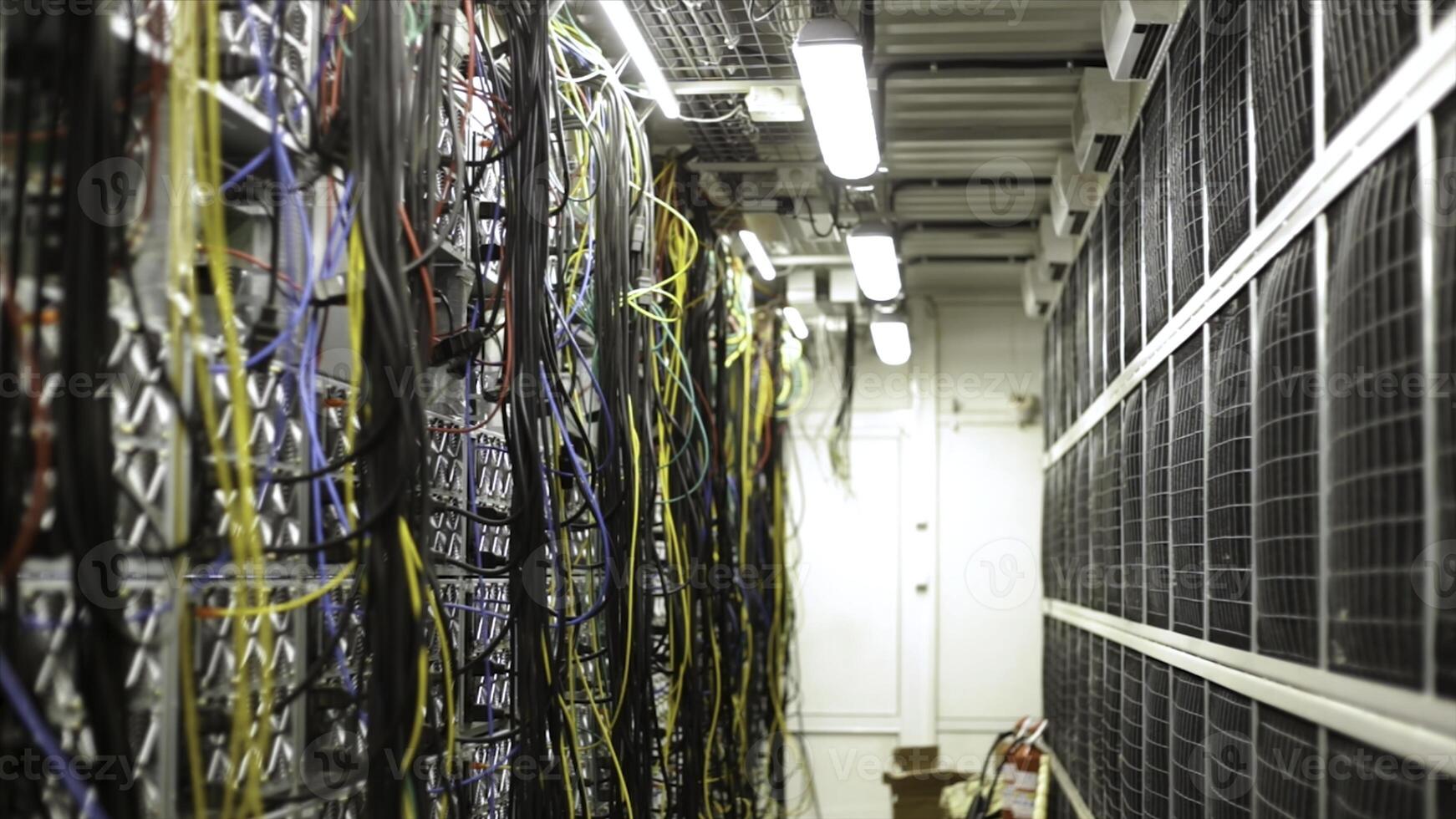 Fiber optic equipment in a data center, IT and modern technologies concept. Stock footage. Server room routers and fiber optical cables. photo