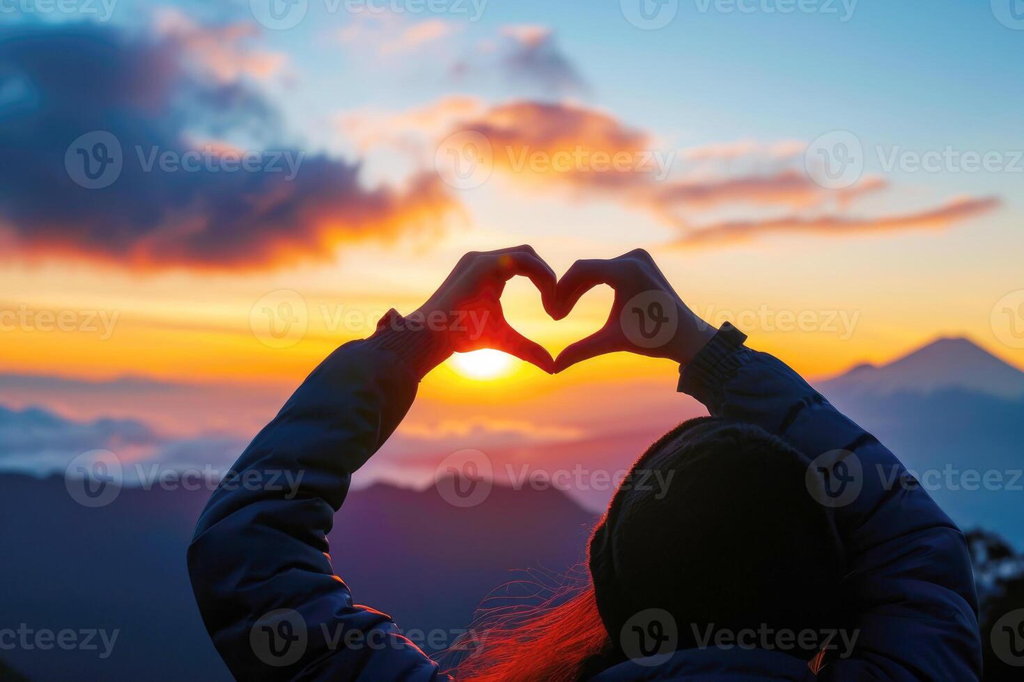 AI generated A woman makes a heart-shaped gesture, while the sunset. AI Background photo