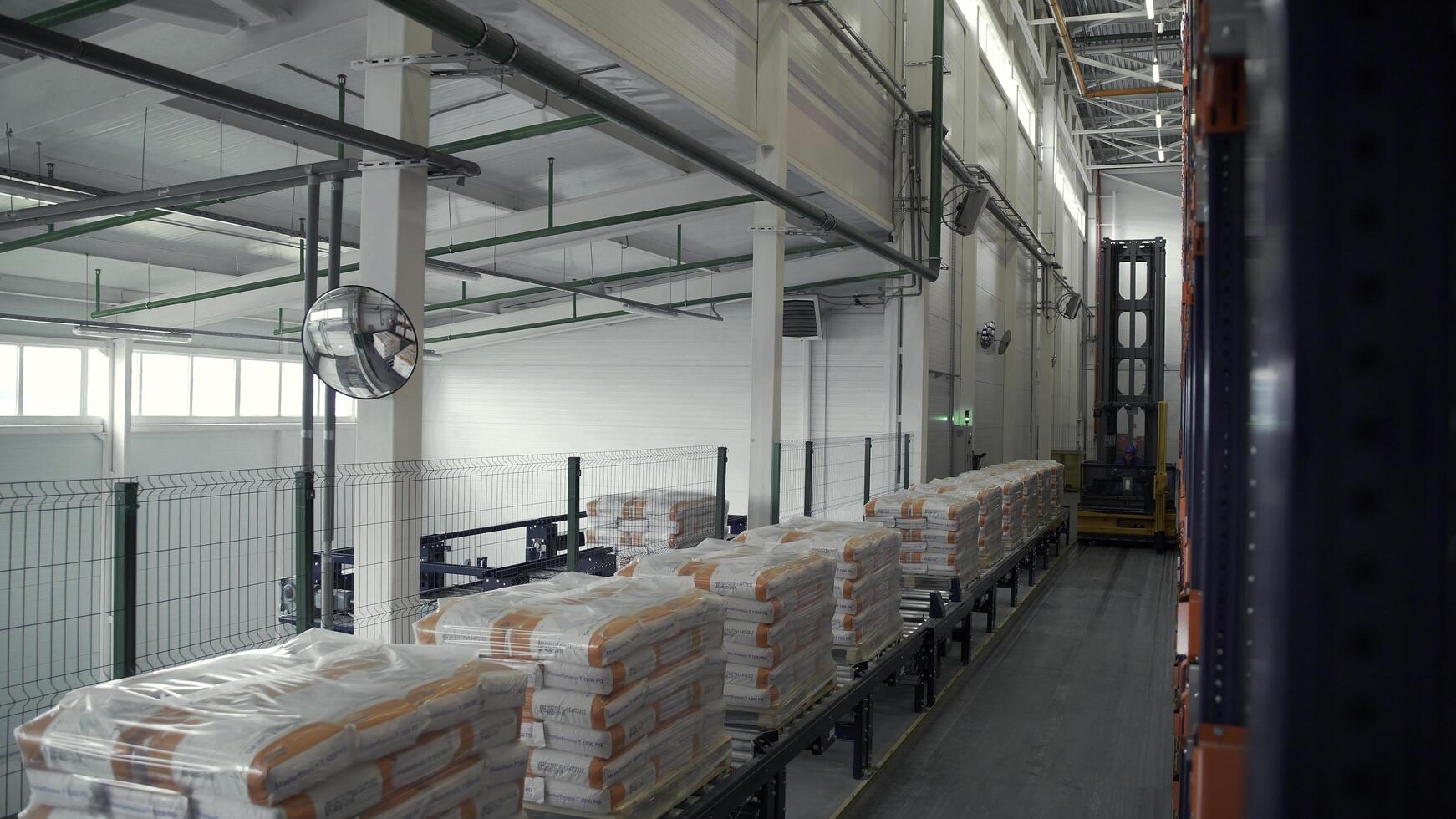 Serbia - Belgrade, September 20, 2022. working day in big modern warehouse. Creative. Forklift trucks on warehouse background. photo