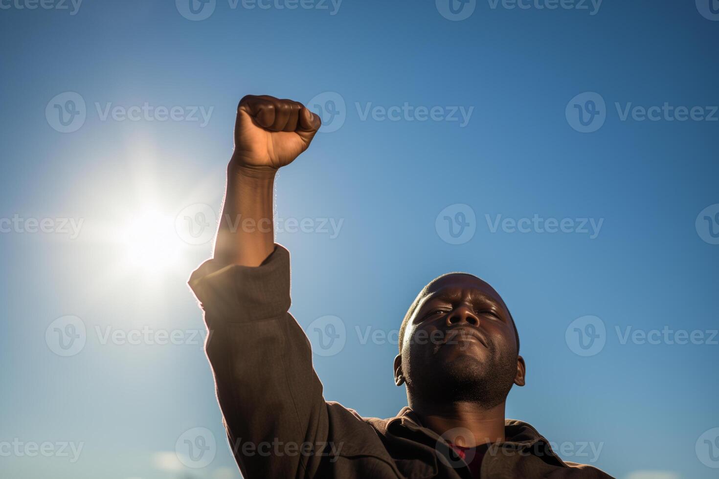 AI generated a black man's fist is raised up against the sky. black history month photo