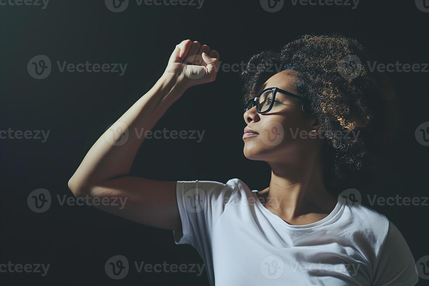 AI generated portrait of afro american woman with raised fist, girl power photo