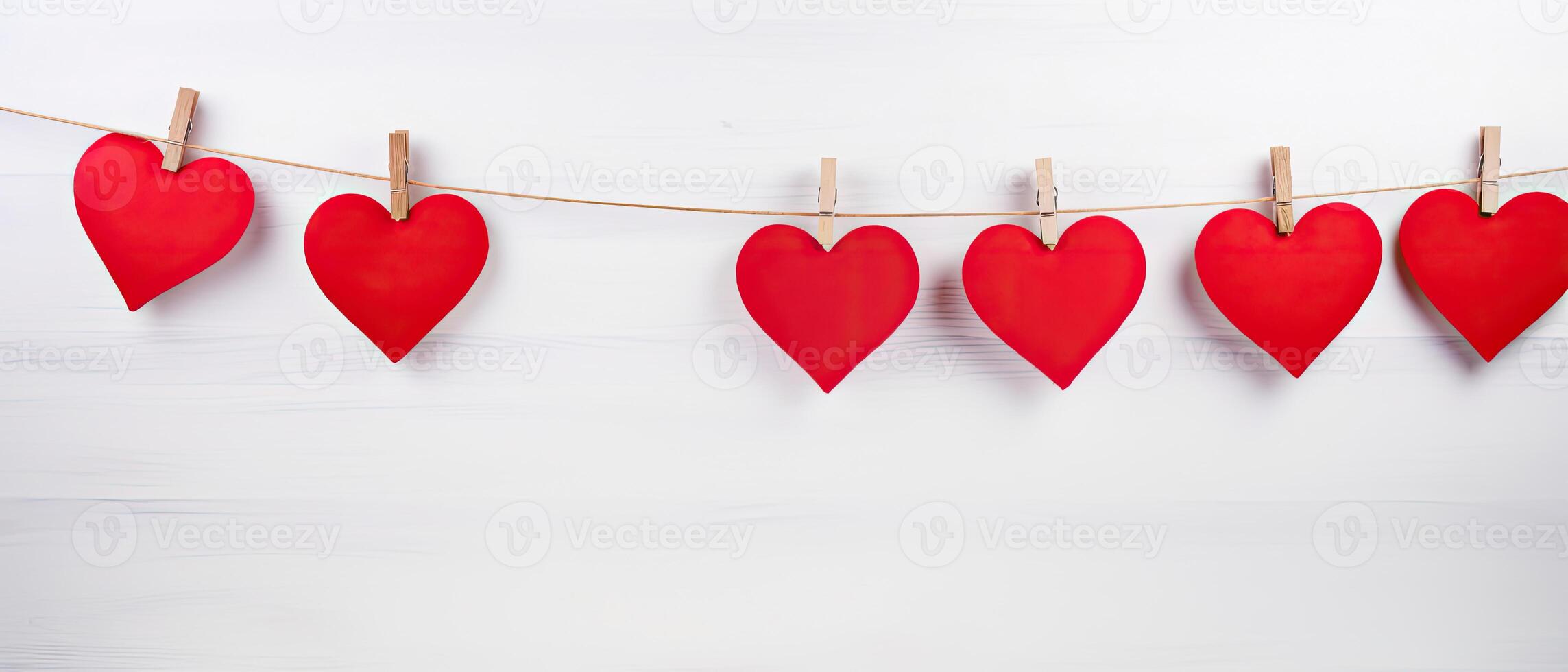 AI generated Red hearts on rope with clothespins on a white wooden Valentine copy space background photo
