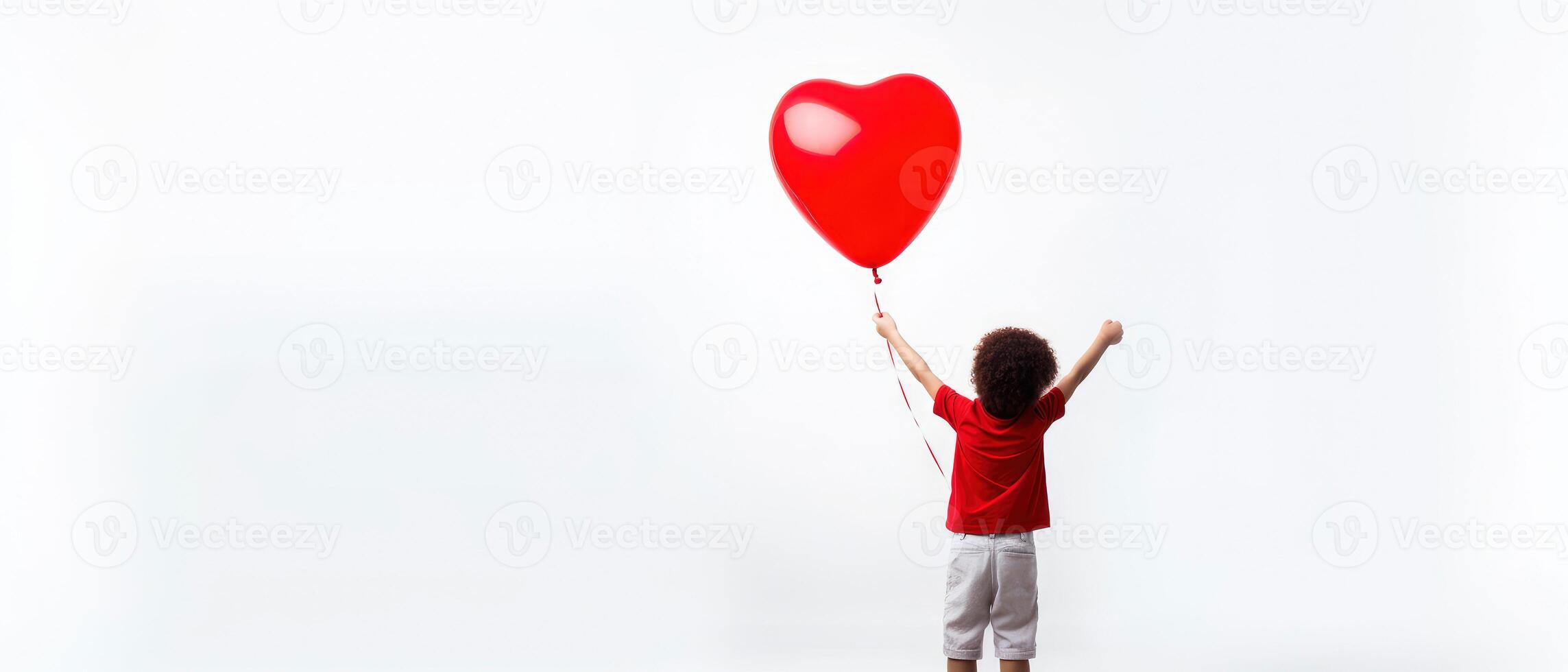 AI generated Back view of a kid raising arms with red love valentine heart shaped balloon isolated on white background photo