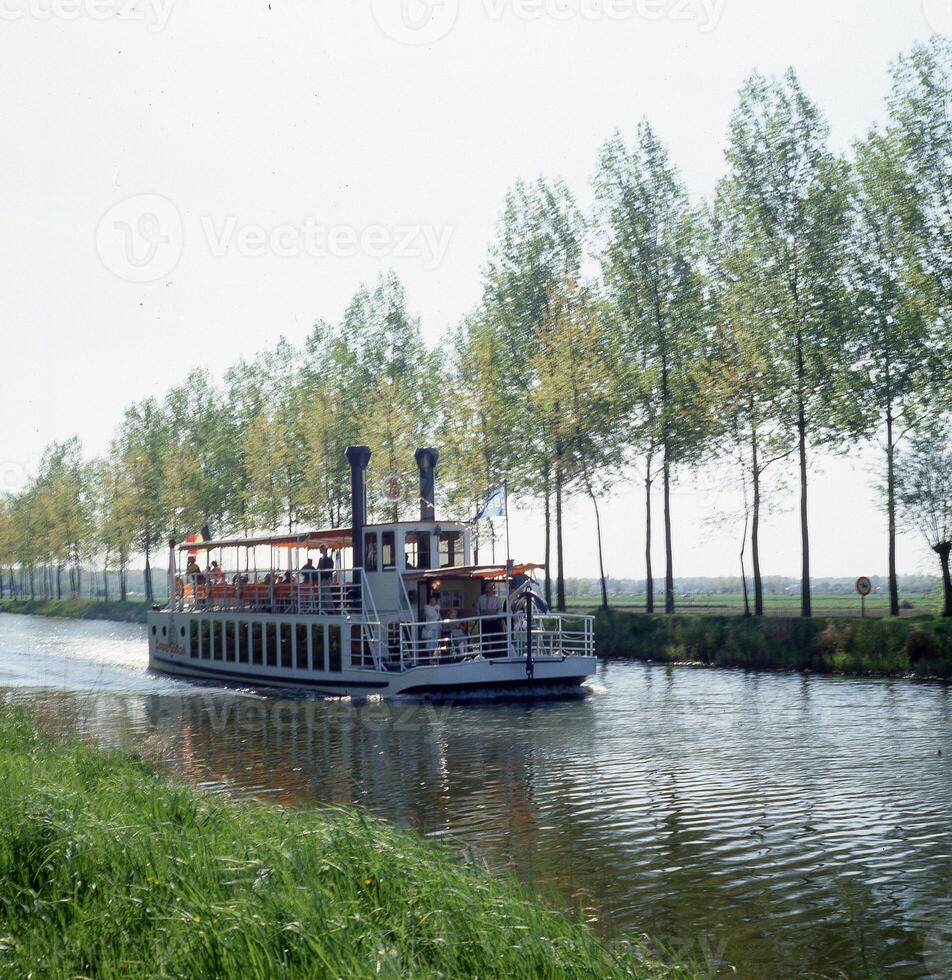 a river with a boat on it photo