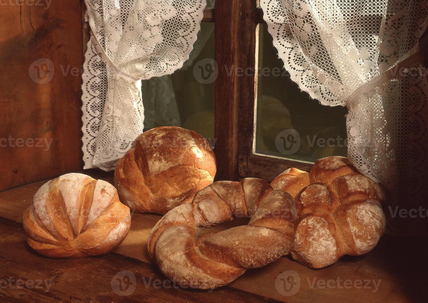 a window with a curtain photo