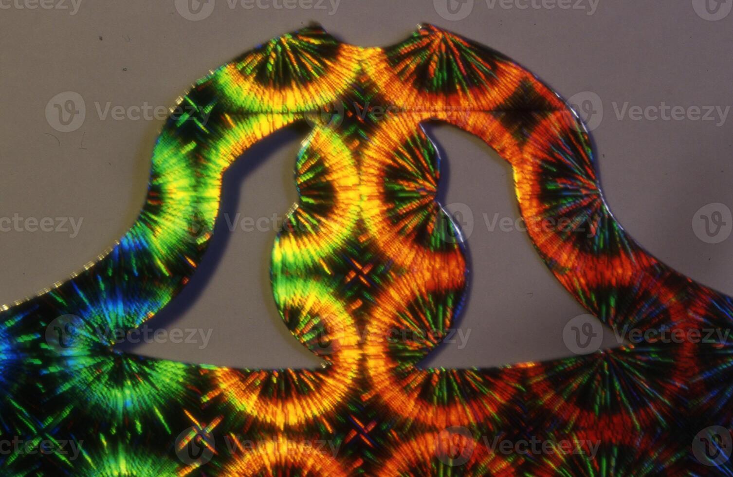 a close up of a colorful pattern on a piece of paper photo