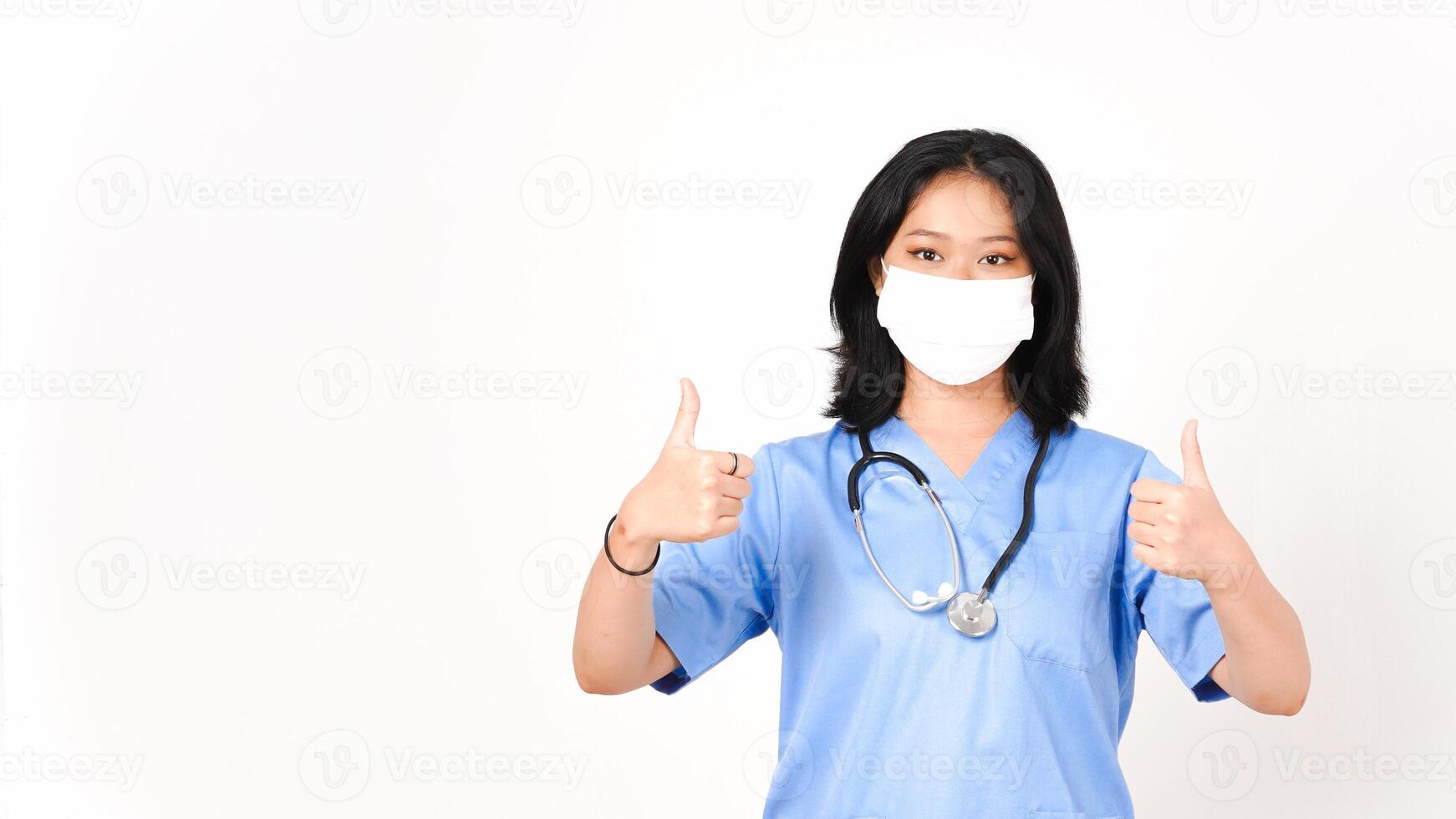 Young Asian female doctor wearing medical mask recommendation isolated on white background photo