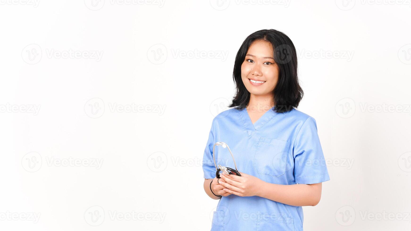 Young Asian female doctor smile and holding the stethoscope isolated on white background photo