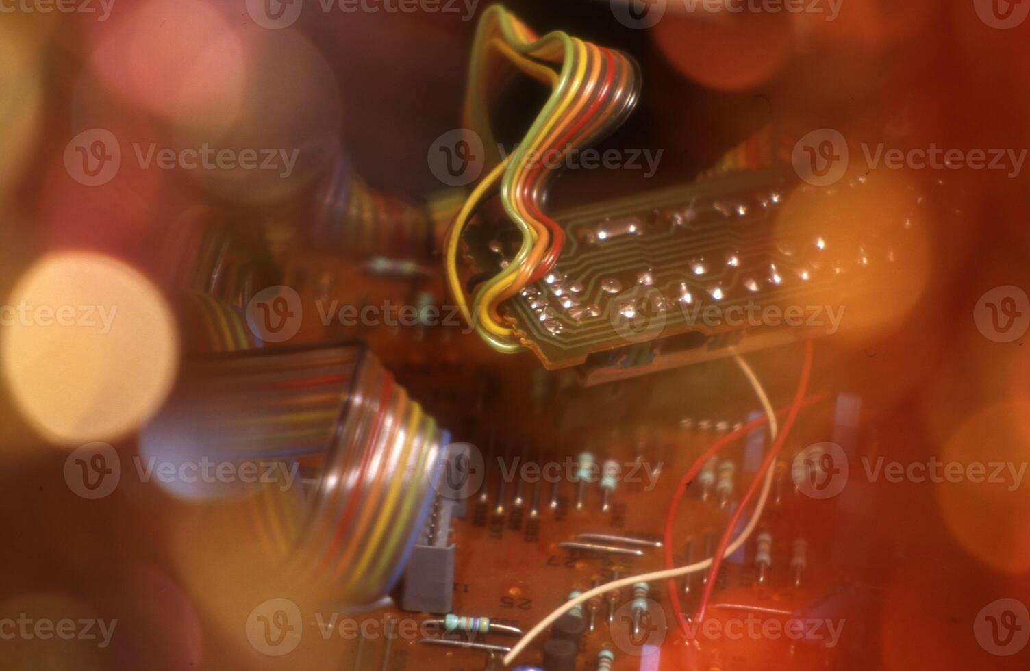 a close up of a circuit board with wires photo