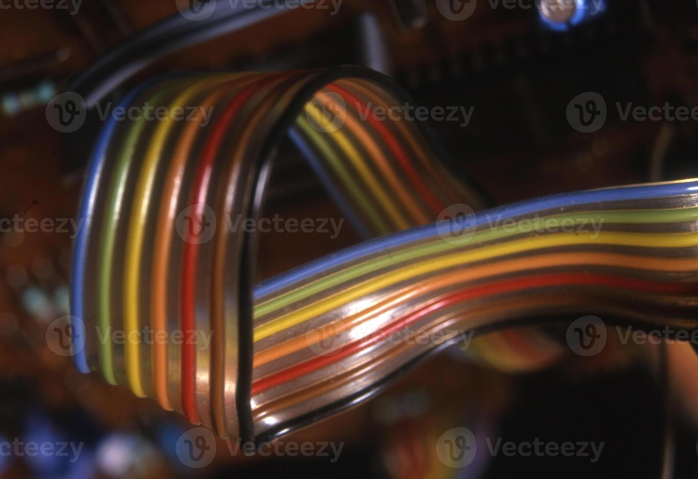 a close up of a multicolored ribbon cable photo