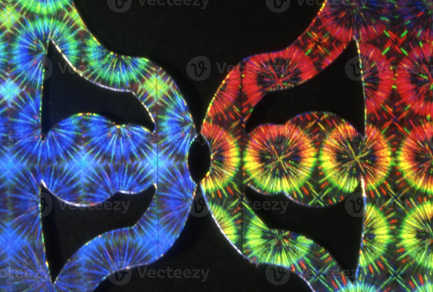two colorful pieces of paper with a design on them photo