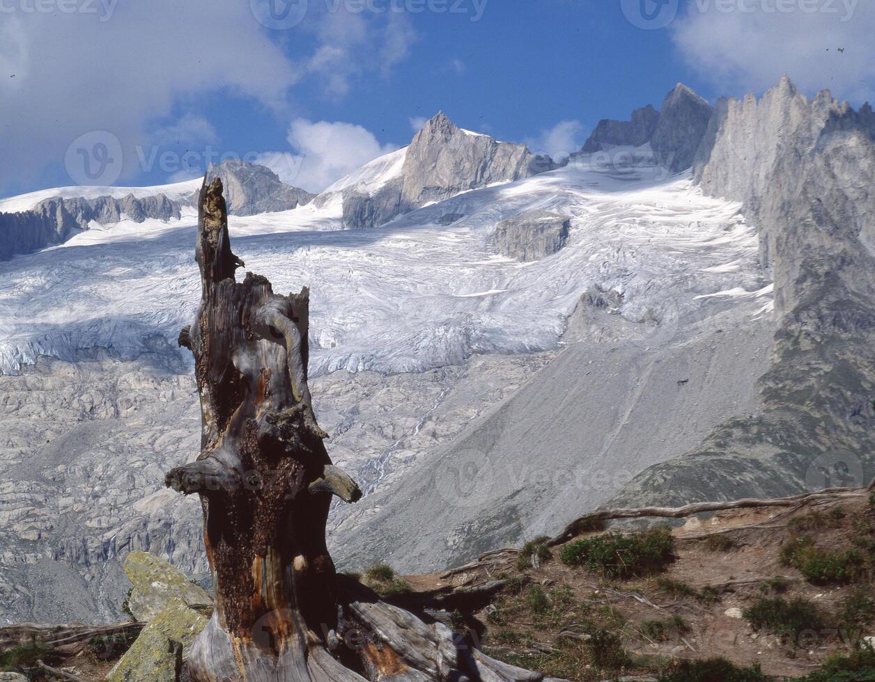 a mountain with snow on it photo