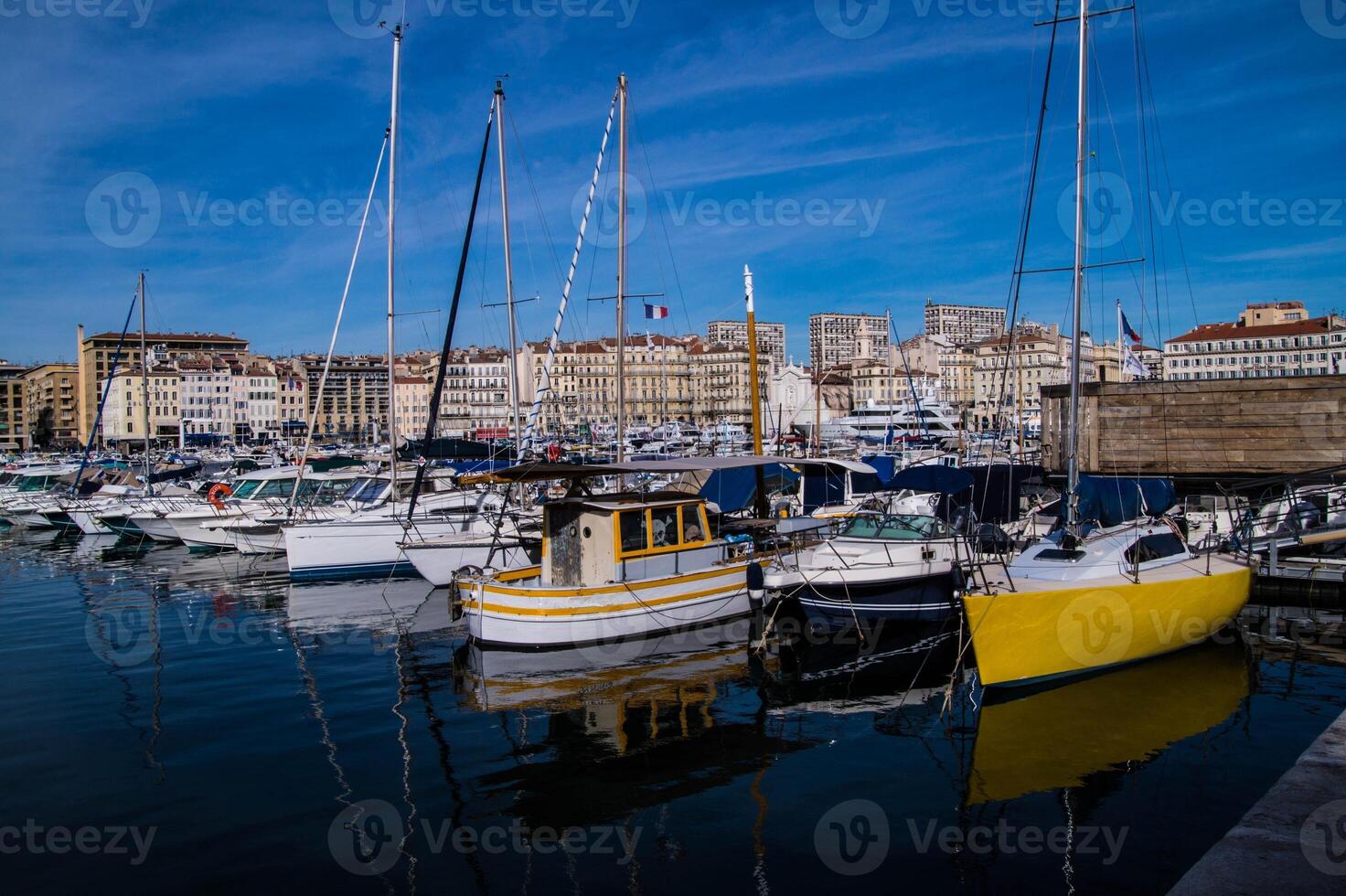 boats docked in the harbor of nice, france photo