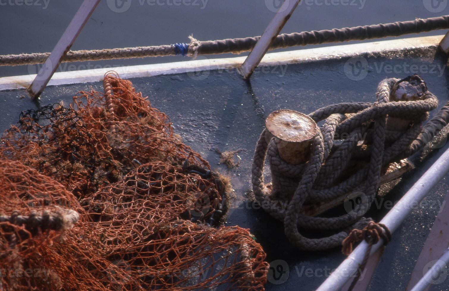 a boat with a rope and a net photo