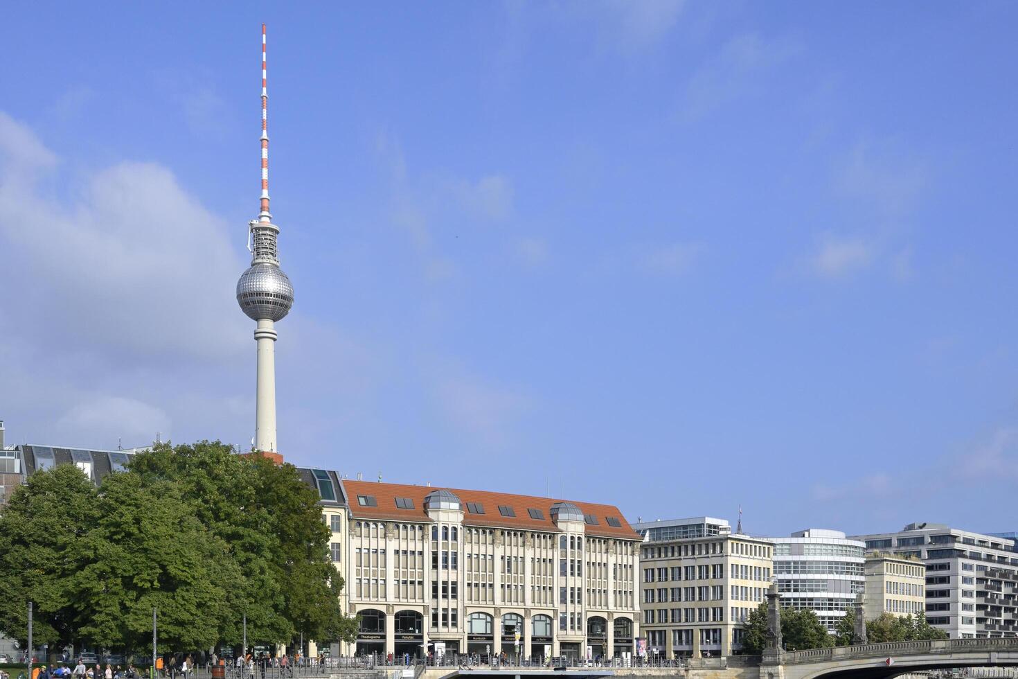 Berlin, Germany, 2021 - Berlin Television tower viewzed from the Spree riverbank, Berlin Mitte district, Berlin, Germany photo