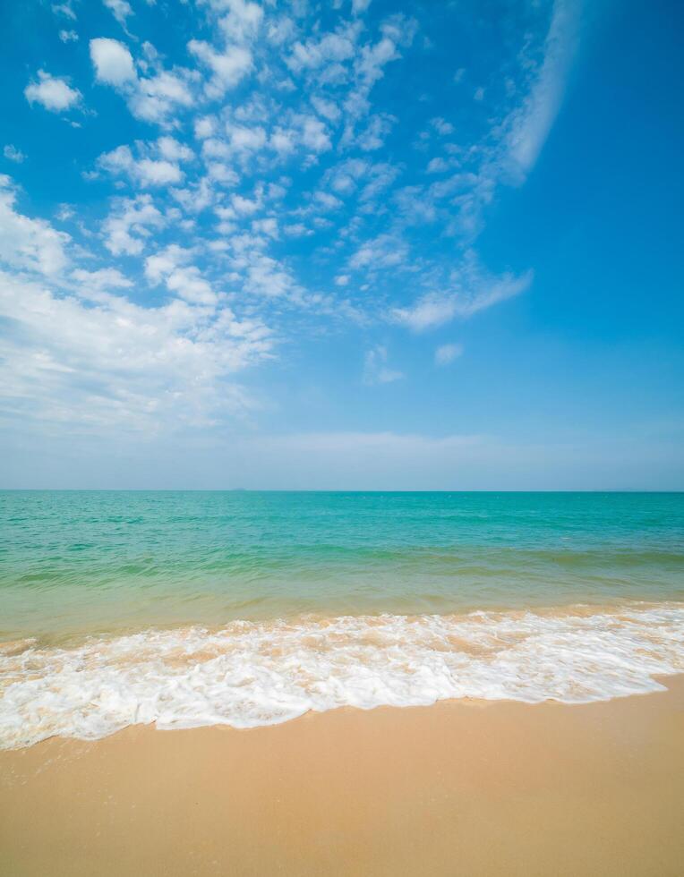 Landscape beautiful summer vertical front view relax tropical sea beach white sand clean blue sky background calm Nature ocean wave water nobody travel at SaiKaew Beach thailand Chonburi sun day time photo