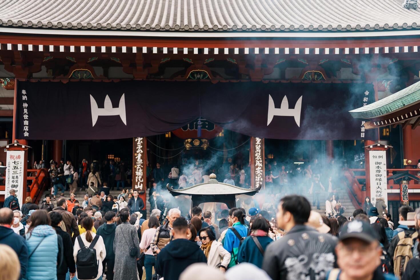 Sensoji or Asakusa Kannon Temple is a Buddhist temple located in Asakusa. It is one of Tokyo most colorful and popular temple. Landmark for tourist attraction. Tokyo, Japan, 18 November 2023 photo