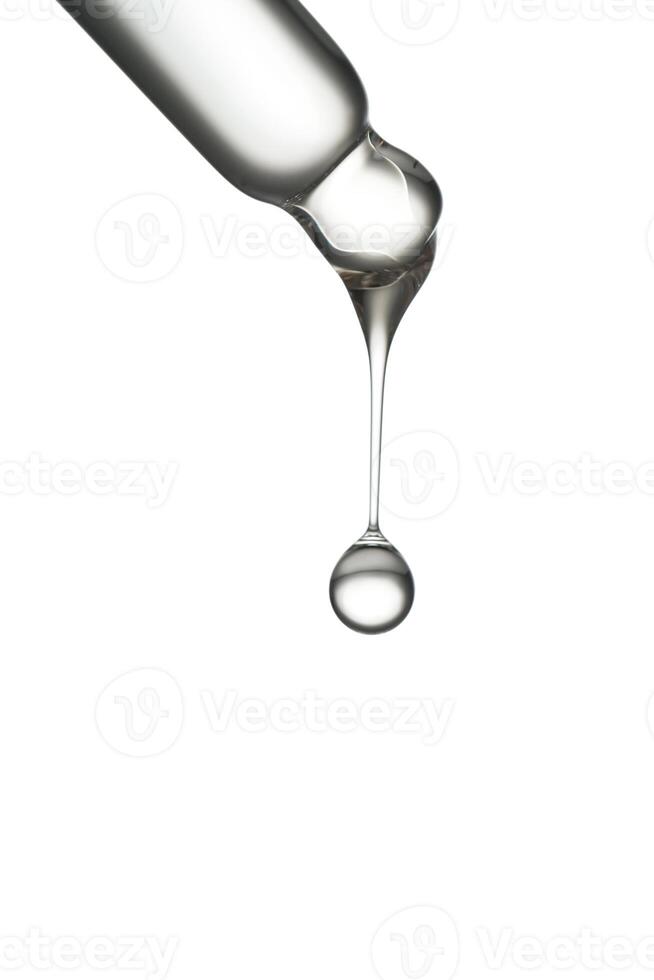 Transparent pipette with serum on an isolated white background. photo