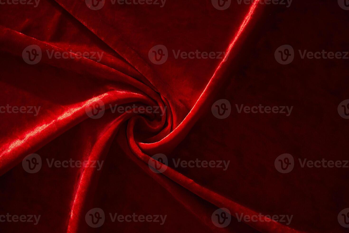 Abstract background made of red velvet fabric. photo