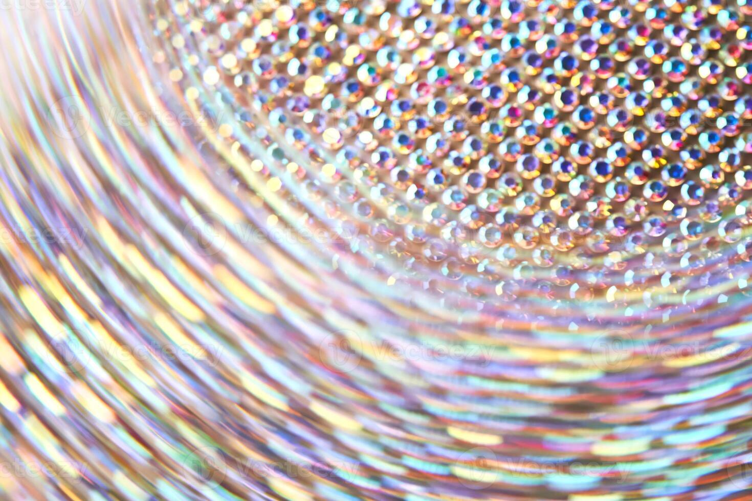 Abstract background made of rhinestones shimmering in the light. photo