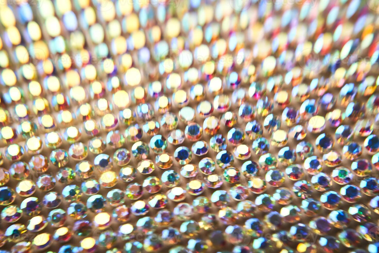 Abstract background made of rhinestones shimmering in the light. photo