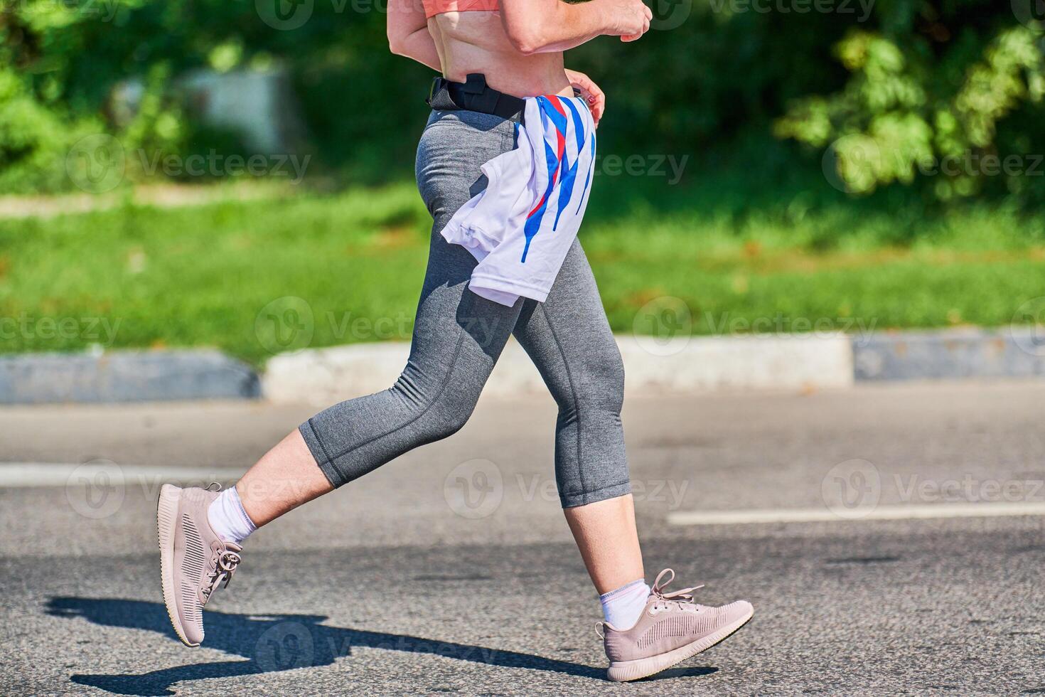 Running woman on road photo