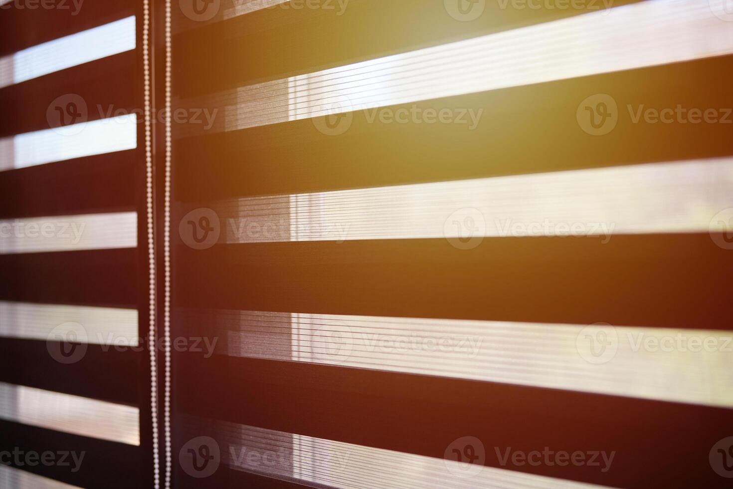 Office blinds. Sunlight through modern fabric blinds. Office meeting room lighting range control. photo