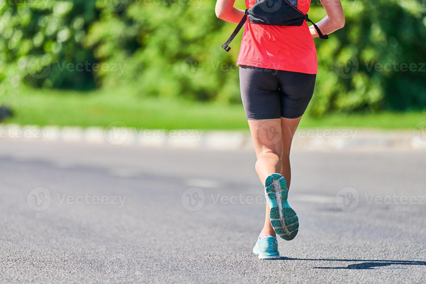 Running woman on road photo