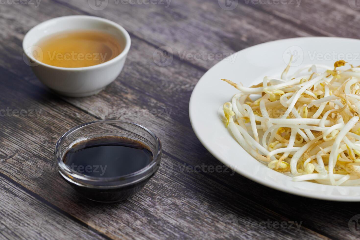 Bean sprouts of mung, maash. Traditional vegan dish in east Asia. Healthy diet food. photo