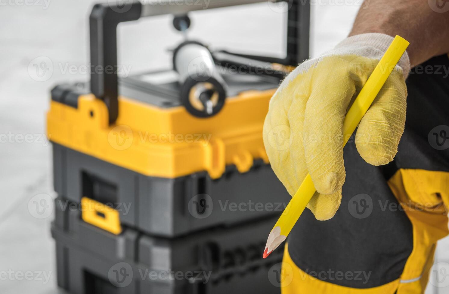 Professional Contractor Worker with a Pencil in His Hand photo