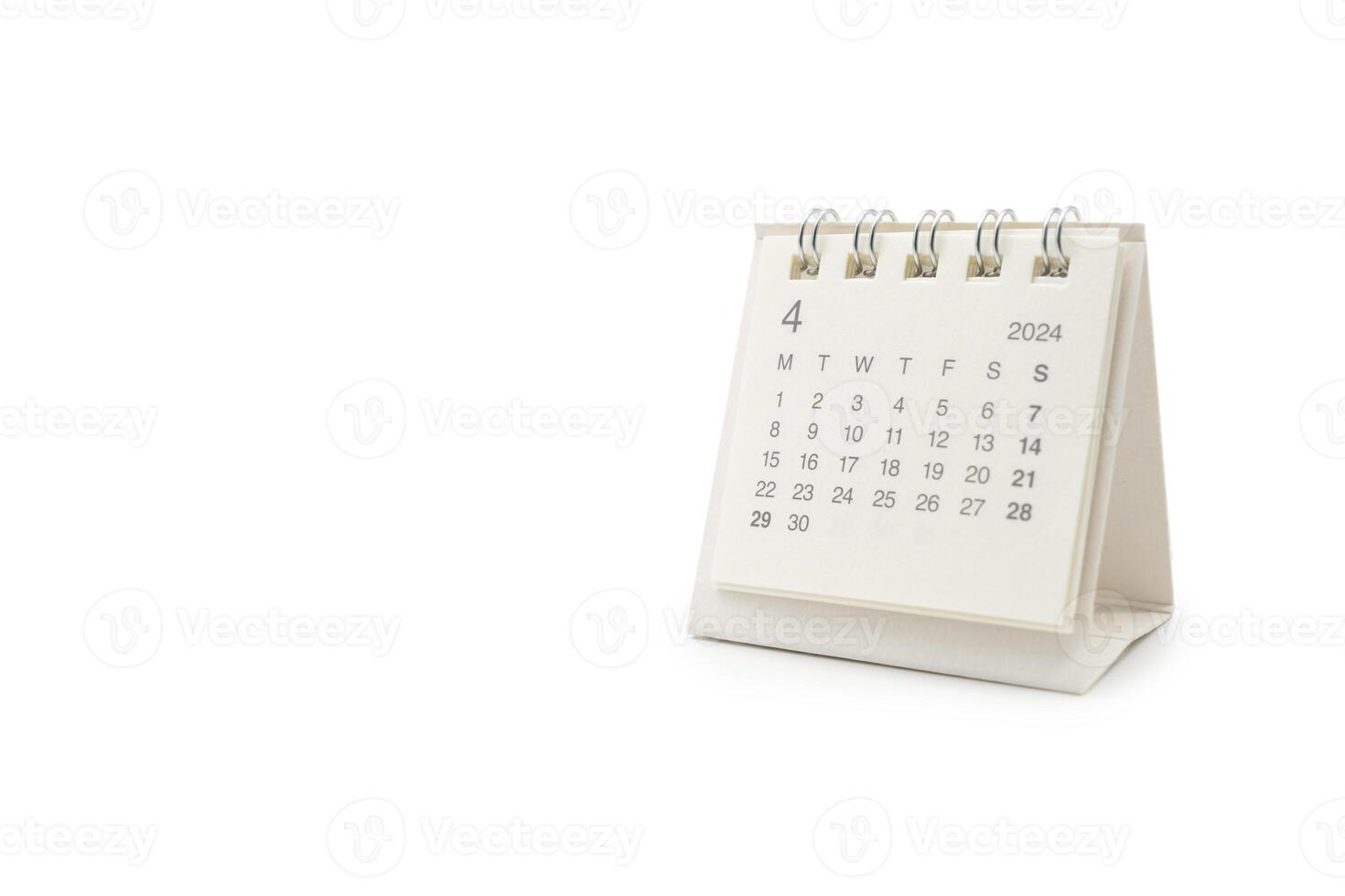 Simple desk calendar for April 2024 isolated on white background. Calendar concept with copy space. Clipping path. photo