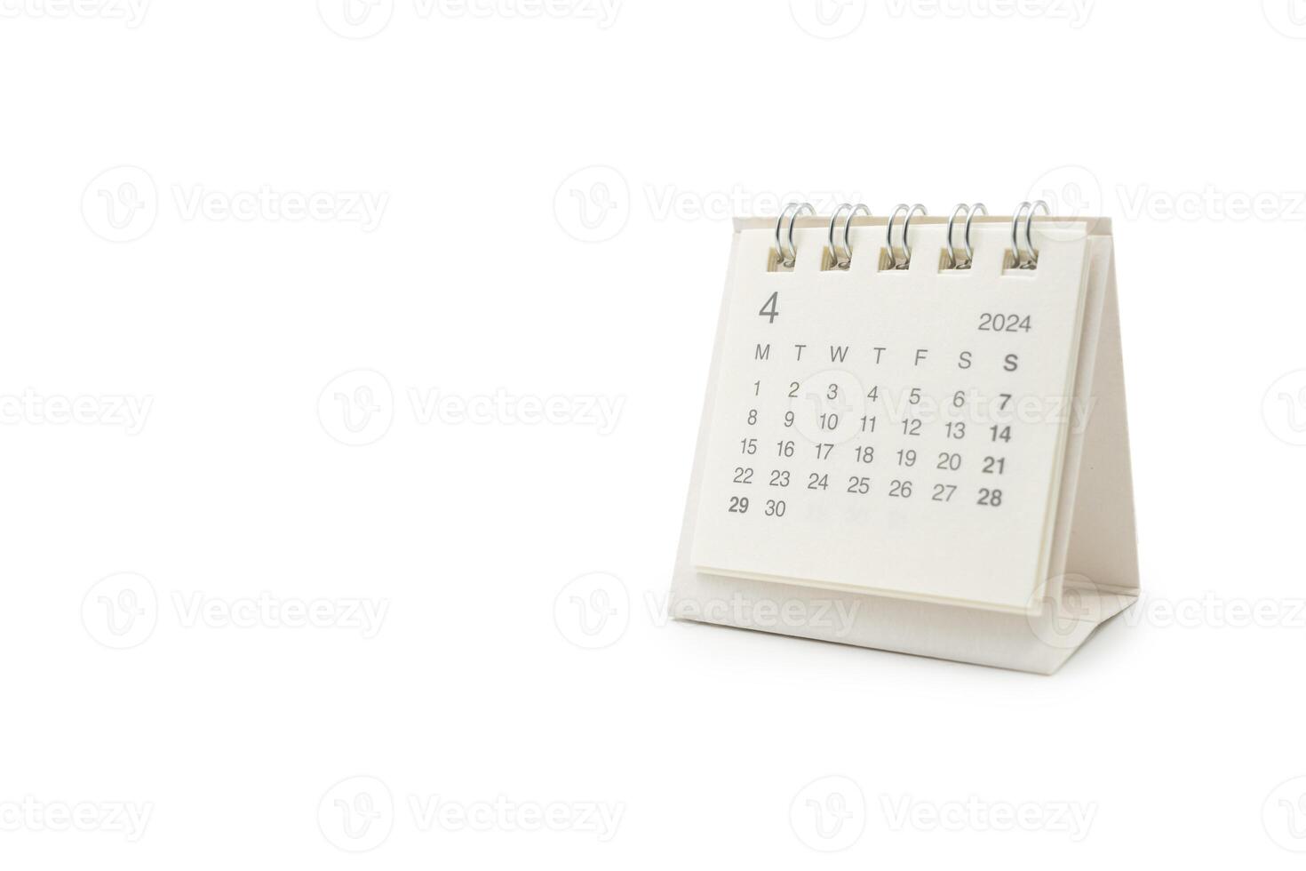 Simple desk calendar for April 2024 isolated on white background. Calendar concept with copy space. Clipping path. photo