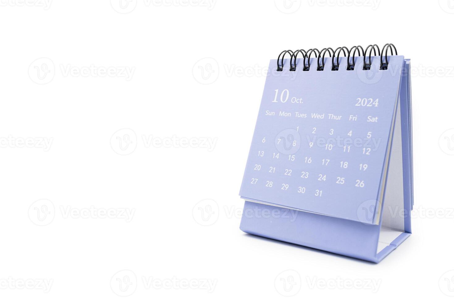 Simple desk calendar for October 2024 isolated on white background. Calendar concept with copy space. photo