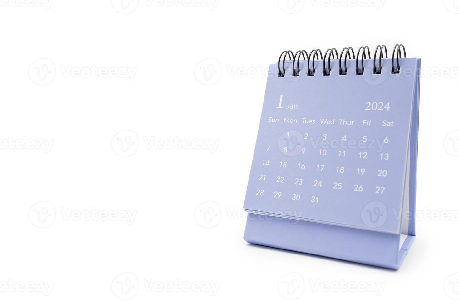 Simple blue desk calendar for January 2024 isolated on white background. Calendar concept with copy space. photo