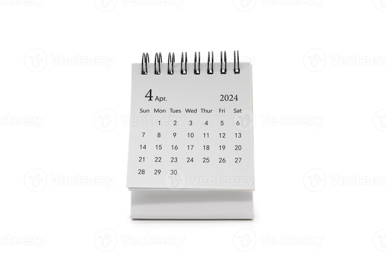 Simple desk calendar for April 2024 isolated on white background. Calendar concept with copy space. photo