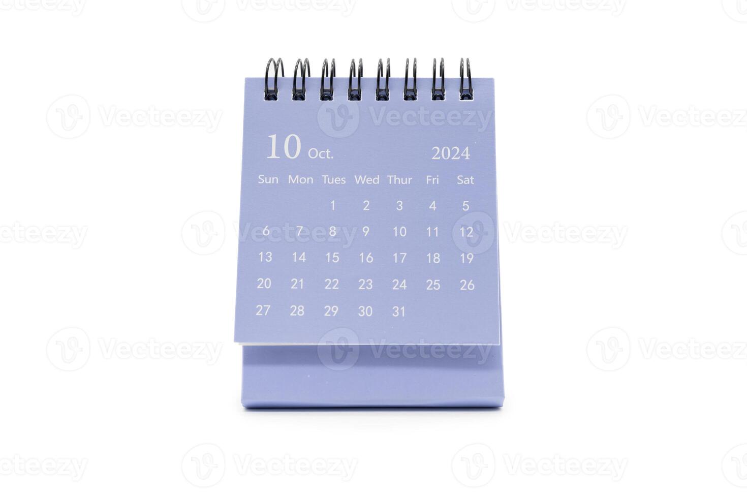 Simple desk calendar for October 2024 isolated on white background. Calendar concept with copy space. photo