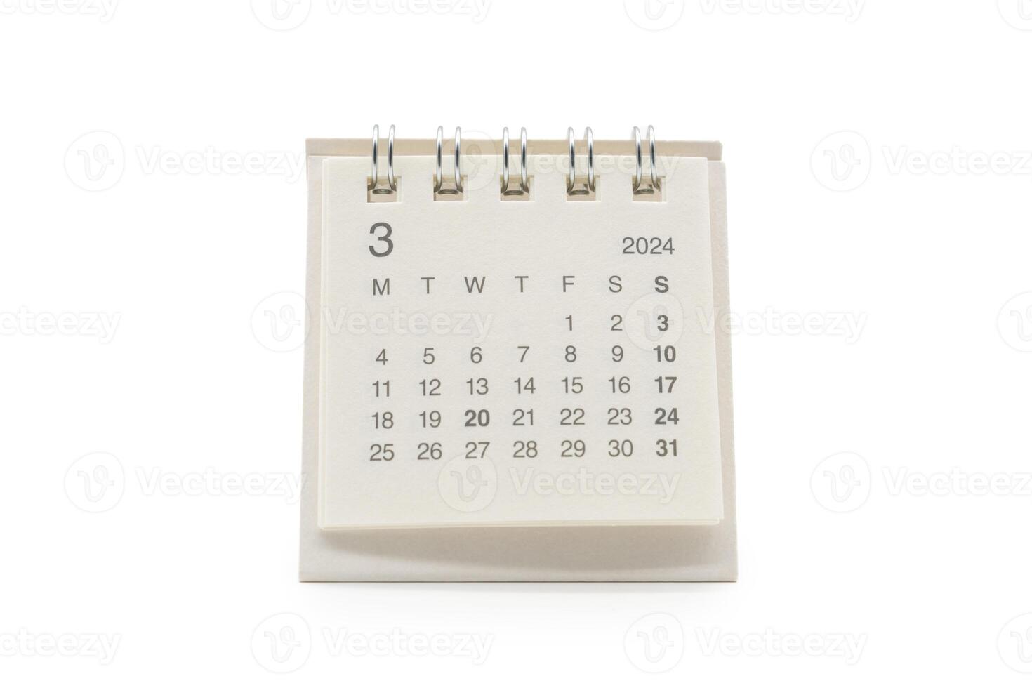 Simple desk calendar for March 2024 isolated on white background. Calendar concept with copy space. photo