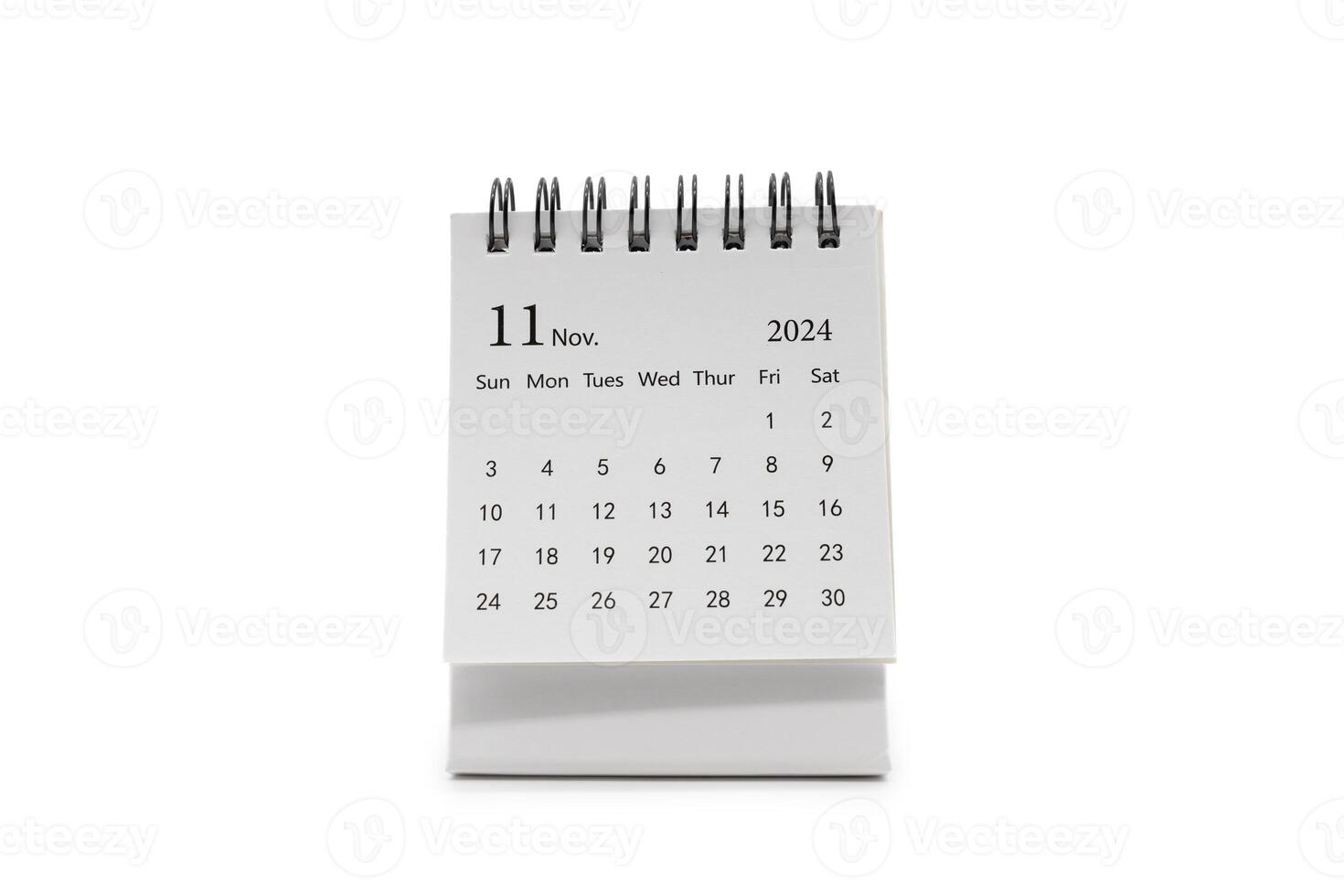 Simple desk calendar for November 2024 isolated on white background. Calendar concept with copy space. photo