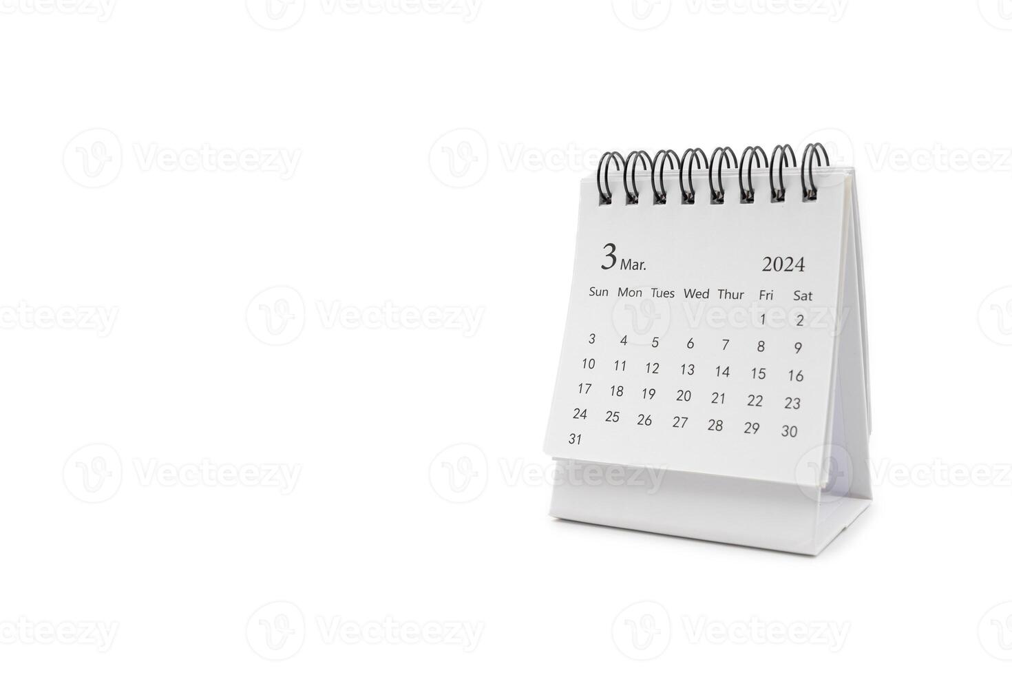 Simple desk calendar for March 2024 isolated on white background. Calendar concept with copy space. photo