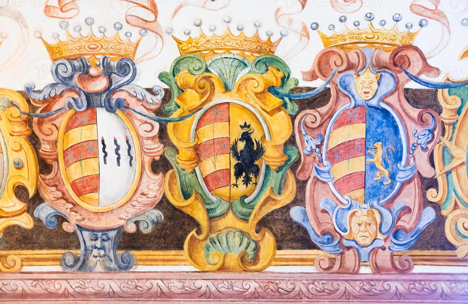 Antique heraldic banner. Medieval decoration ornament, vintage shield shape. photo