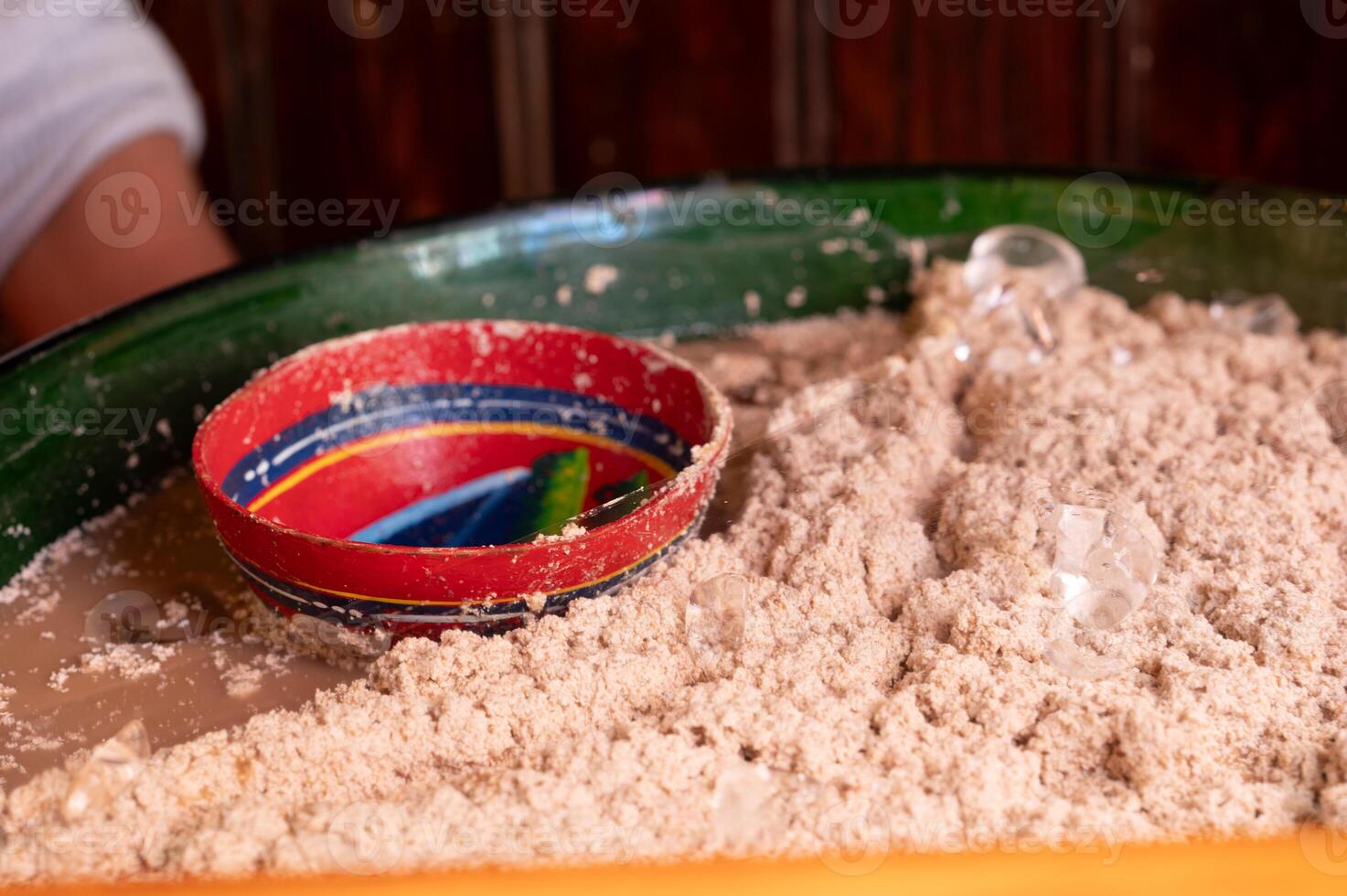 Traditional oaxacan Mexican beverage called Tejate made of ground corn in a big pot. oaxaca photo