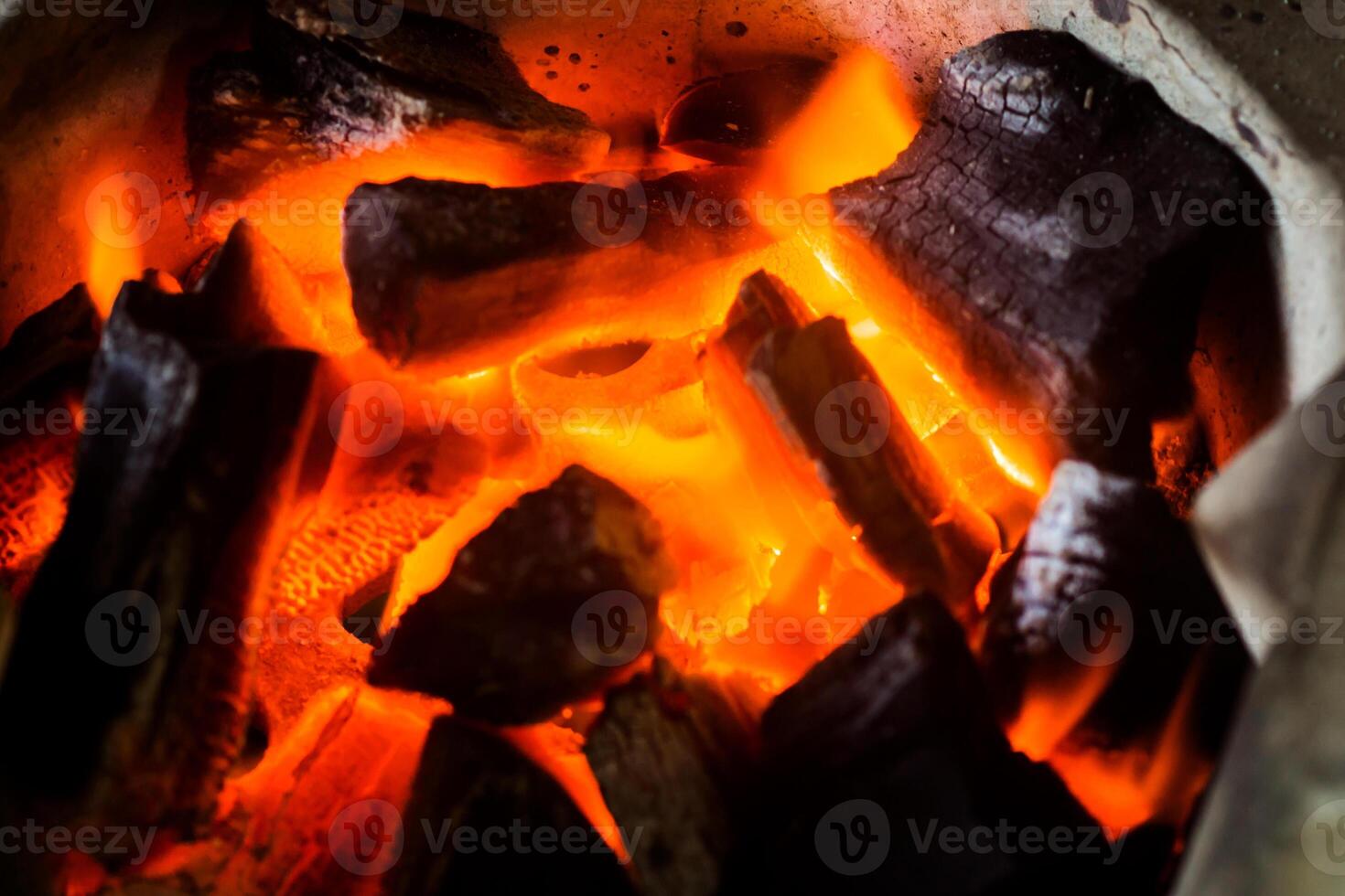 Close up of Charcoal burning. photo