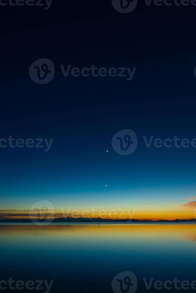 Twilight sky with first star. photo