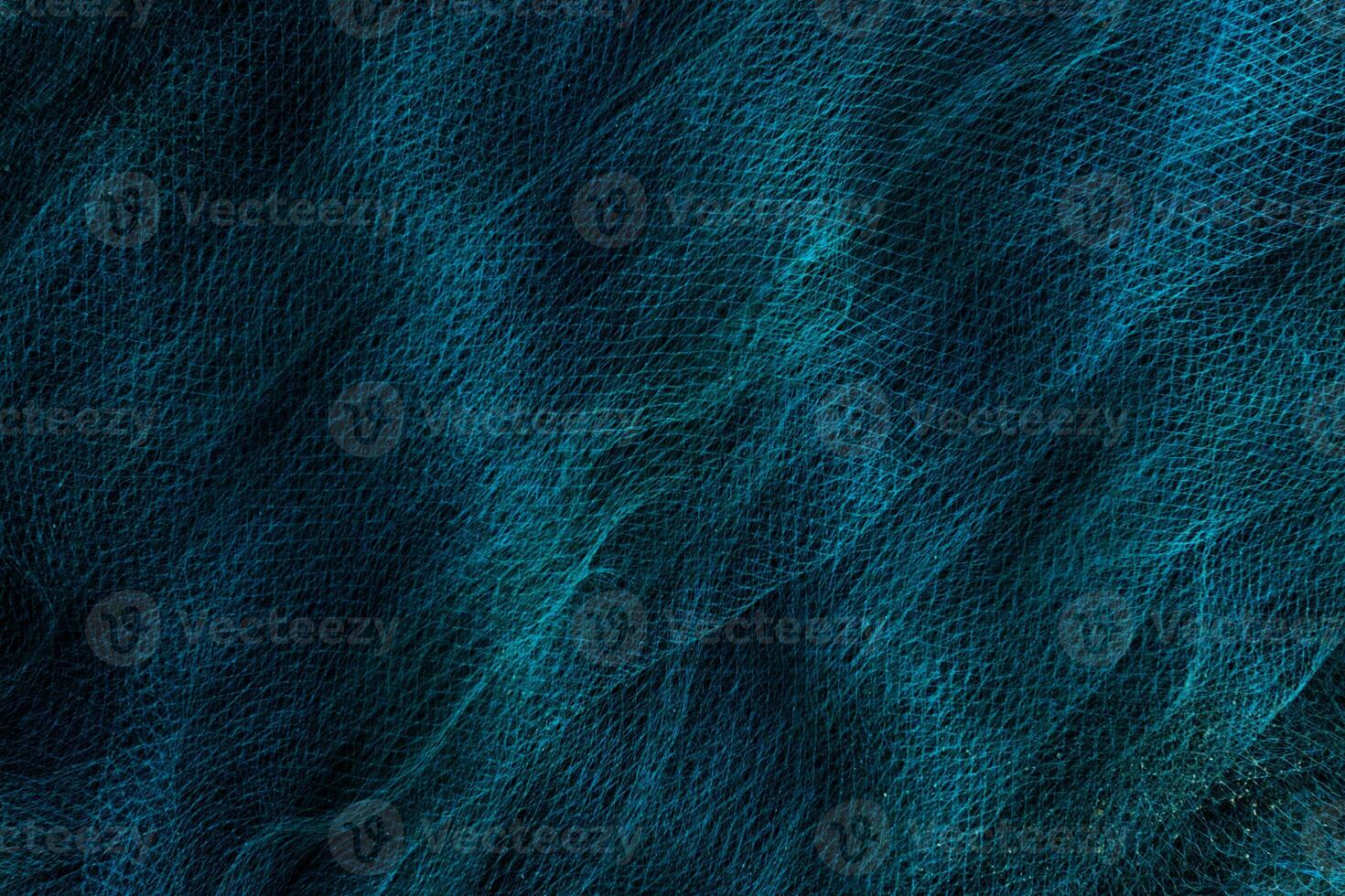 Blue nets background in the dark. photo