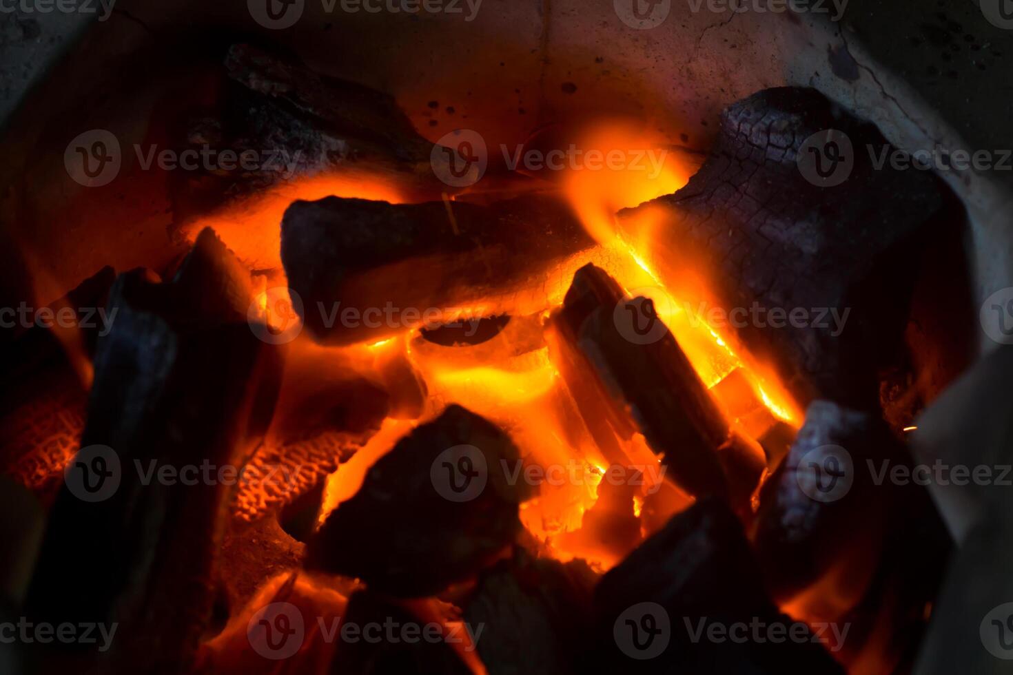 Close up of Charcoal burning. photo