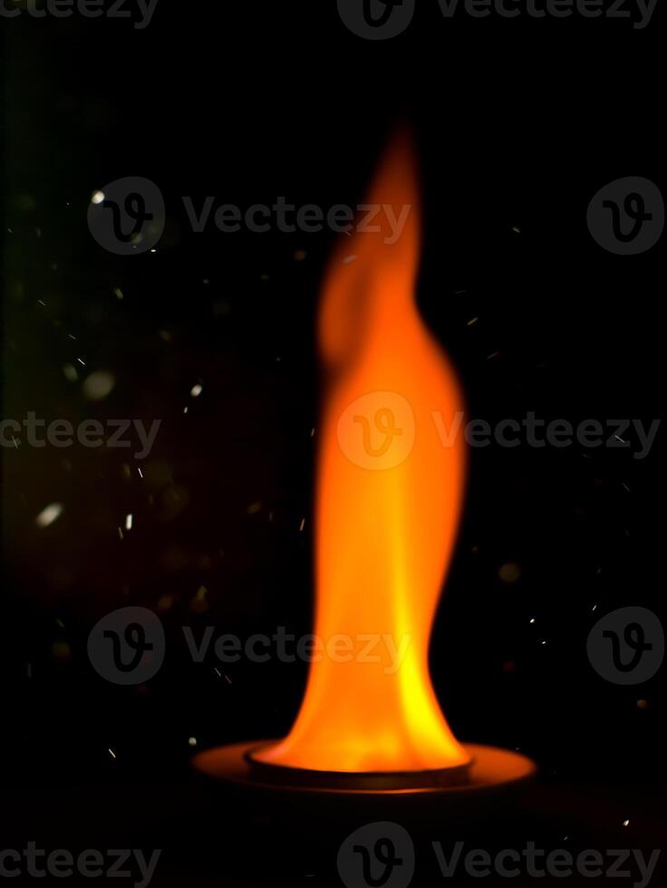 Close up of fire in the dark background photo