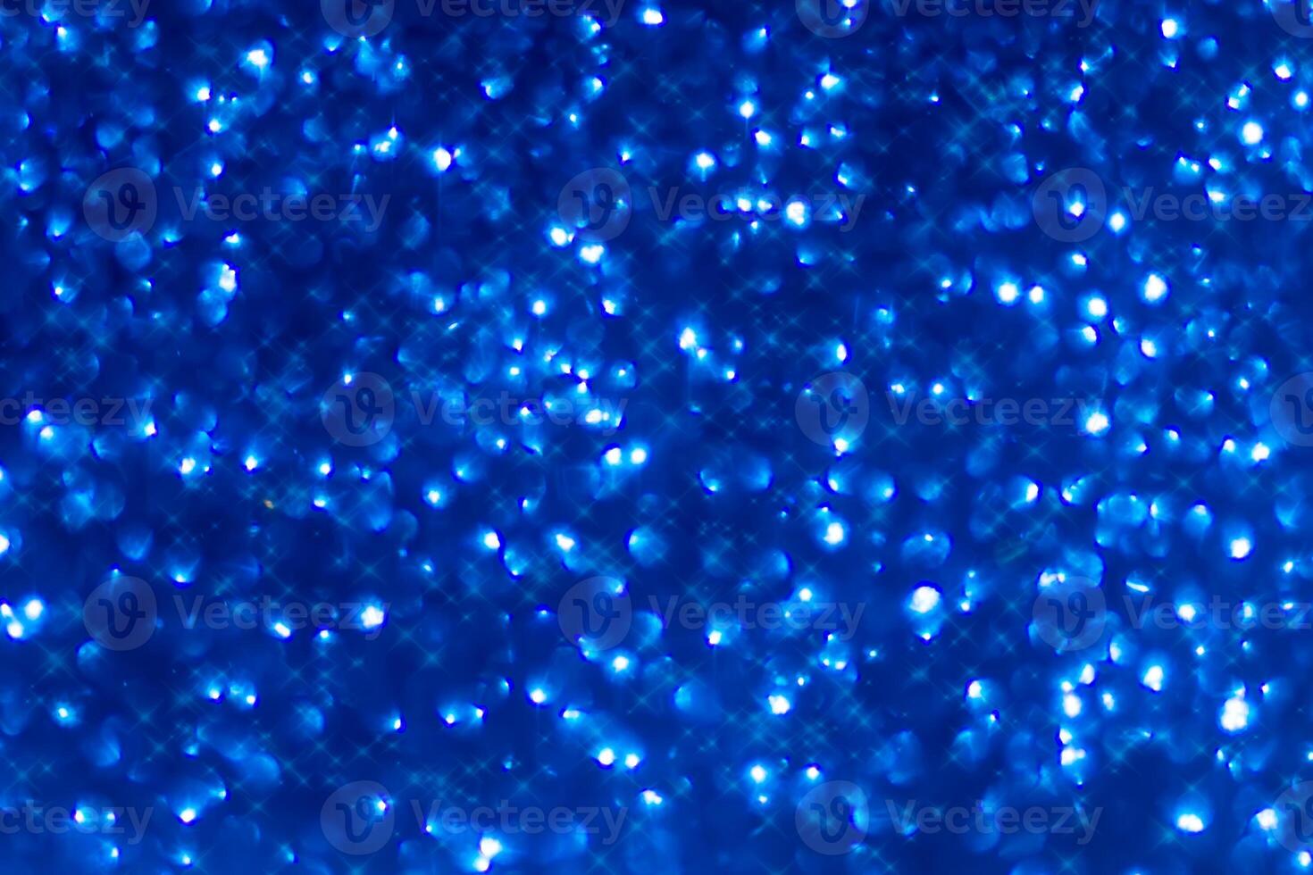 Blue Sparkling Glitter bokeh Background. photo