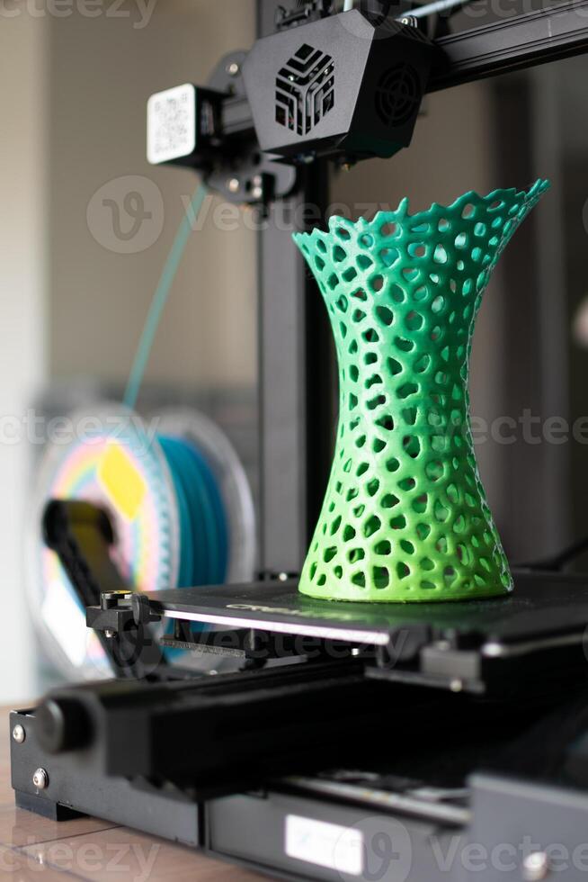 3d printing of a vase with multicolored pla filament photo