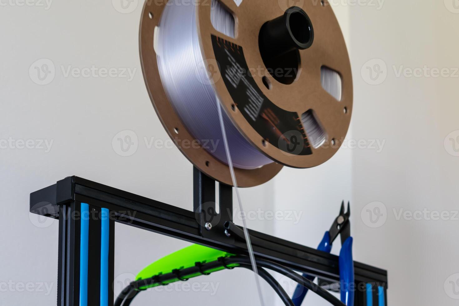 Spool of pla filament for printing 3d printer, material coils photo