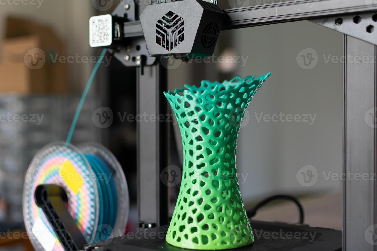 3d printing of a vase with multicolored pla filament photo